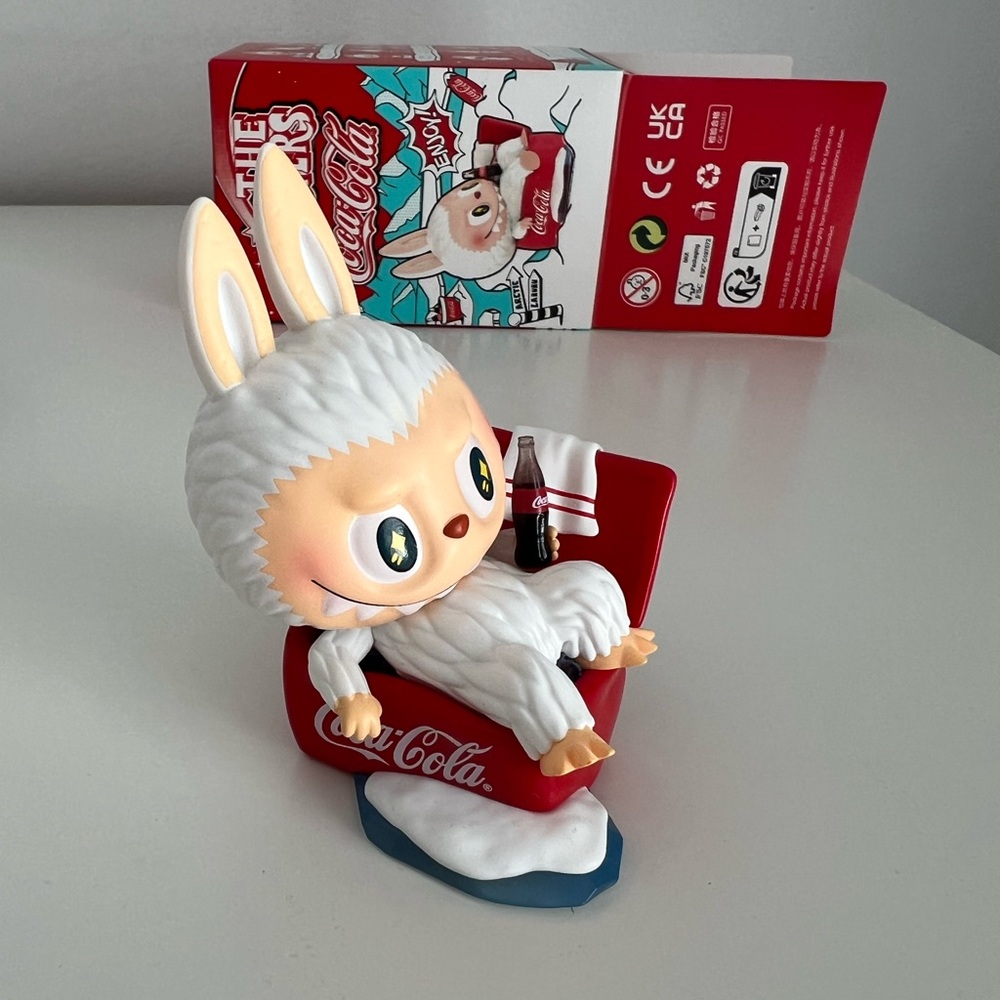 Popmart The Monsters Labubu Coca-Cola “Special Sofa” Figurine